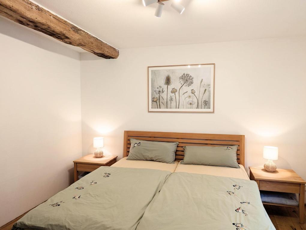 Ένα ή περισσότερα κρεβάτια σε δωμάτιο στο Ferienhaus am Gässchen