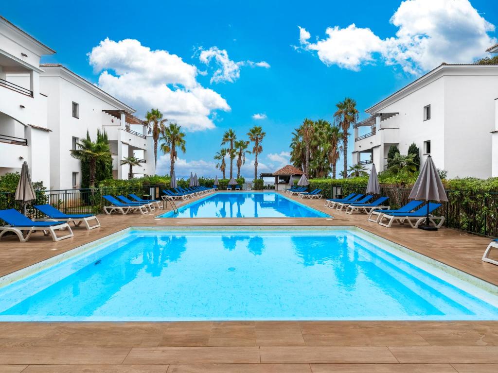 Bazén v ubytování Vacancéole - Résidence Sognu di Rena nebo v jeho okolí