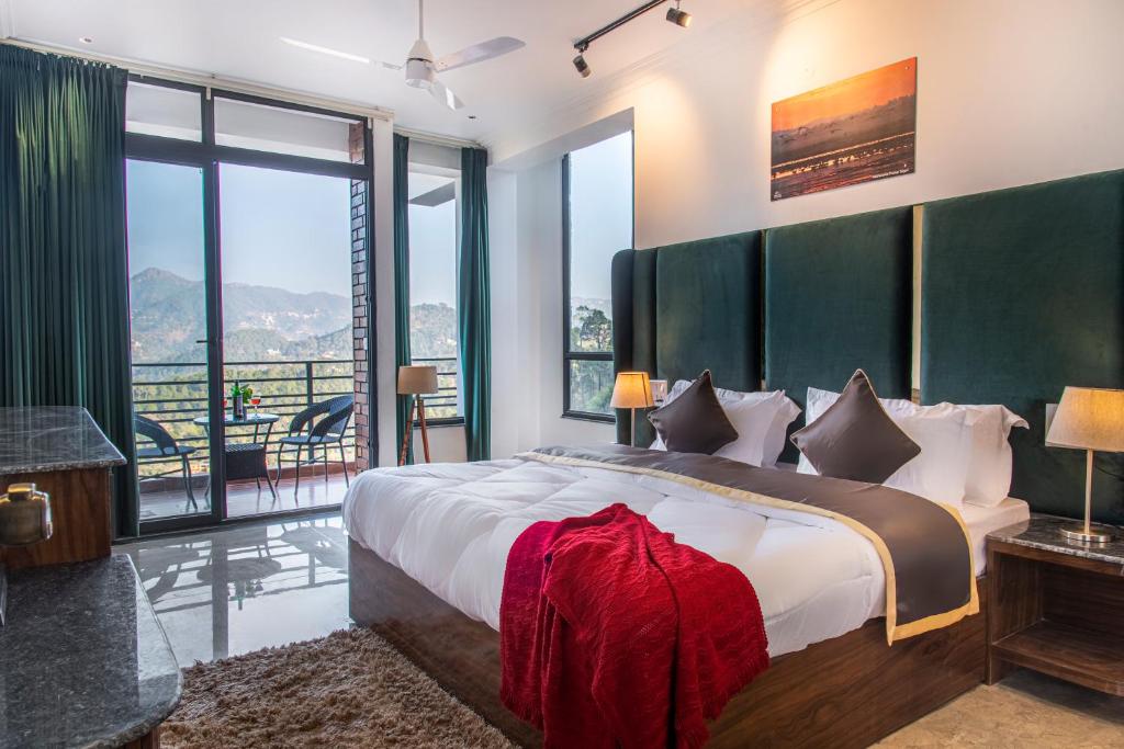 Postel nebo postele na pokoji v ubytování The Blakemore Kasaauli