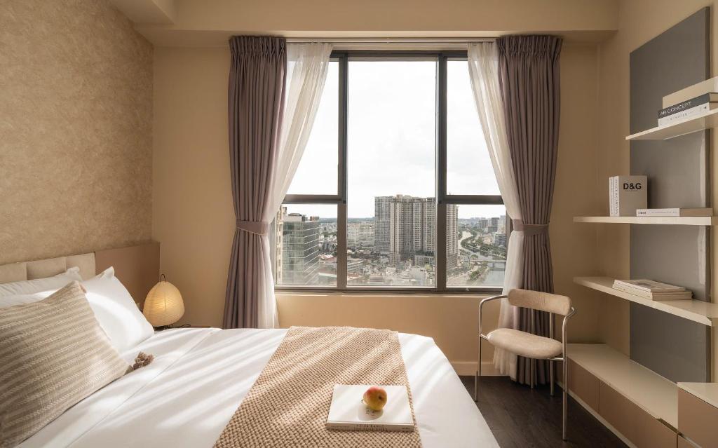 Postel nebo postele na pokoji v ubytování Tresor Apartments, City Centre, Near Ben Thanh Market