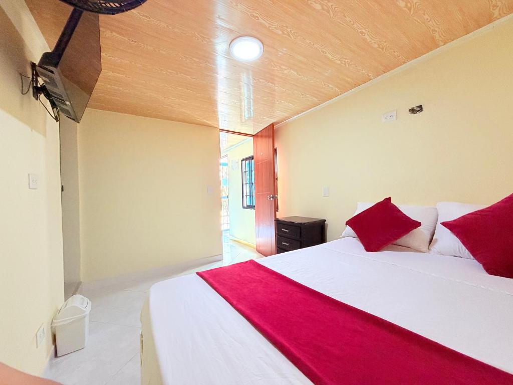 Ένα ή περισσότερα κρεβάτια σε δωμάτιο στο Hotel San Vicente