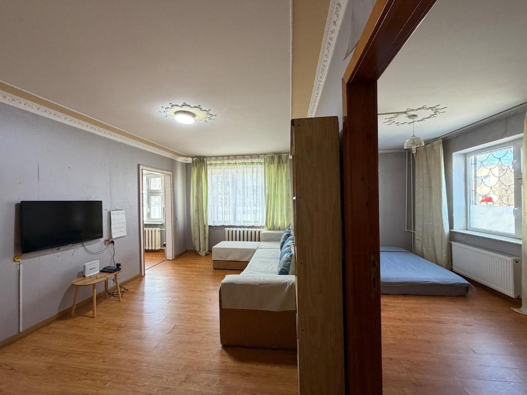 Katil atau katil-katil dalam bilik di Cozy apartment