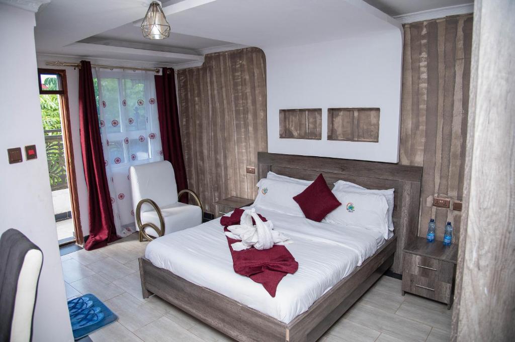 Postel nebo postele na pokoji v ubytování Three Rivers Resort Maragua