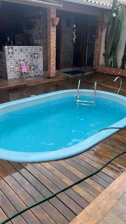 Swimmingpoolen hos eller tæt på Casa completa com piscina e hidromassagem