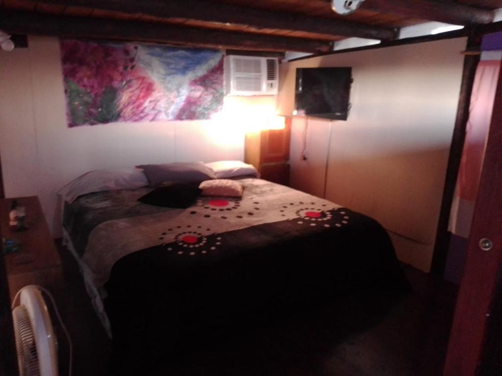 Ένα ή περισσότερα κρεβάτια σε δωμάτιο στο El Nido