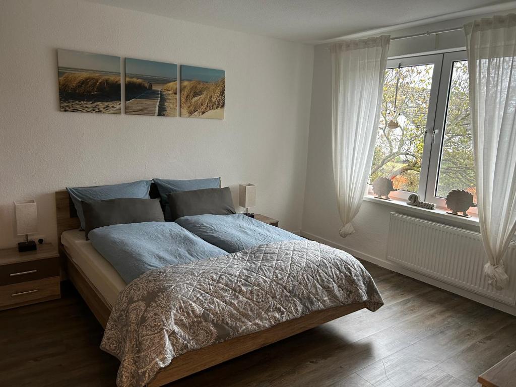 Ένα ή περισσότερα κρεβάτια σε δωμάτιο στο Haus Egon