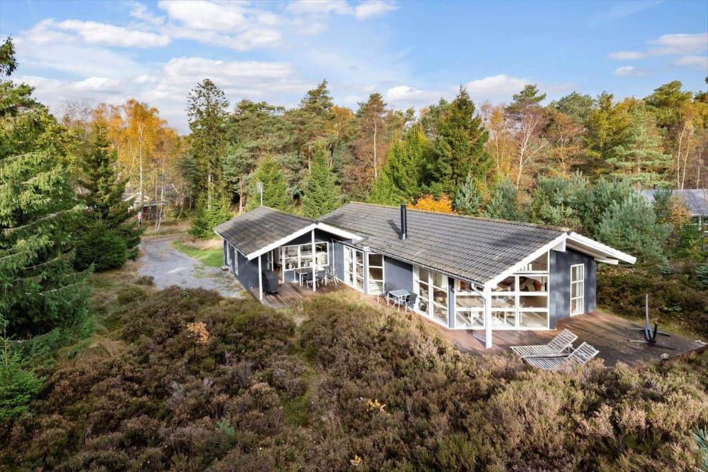 an aerial view of a house in the woods at 2502-Nexo-Gubbegardsvejen-31 in Neksø