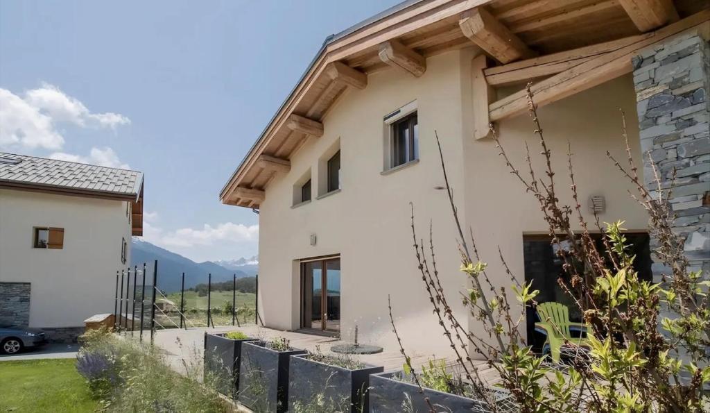a villa with a view of a house at Chalet d'Aussois Lerovi in Aussois