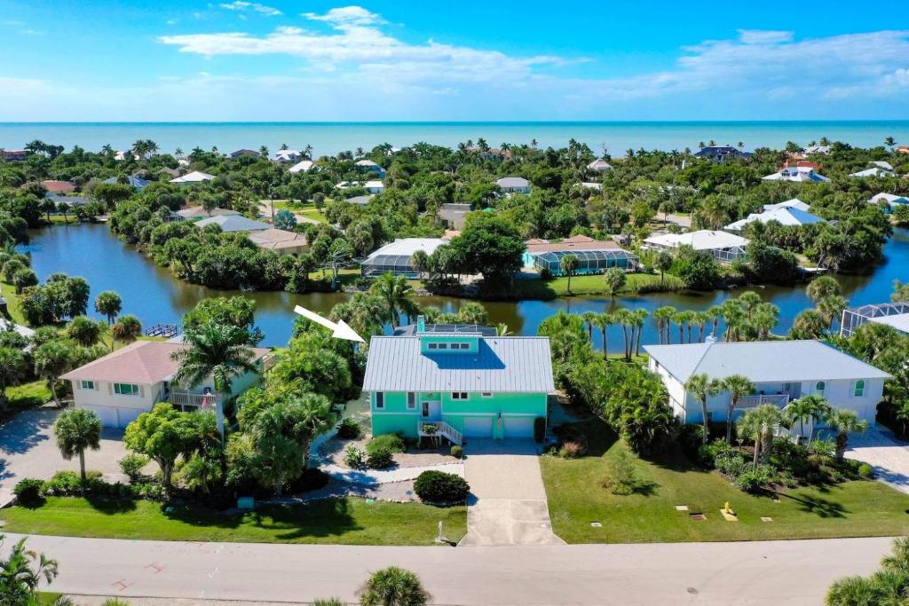 an aerial view of a resort with the ocean at The Turtle Nest in Sanibel