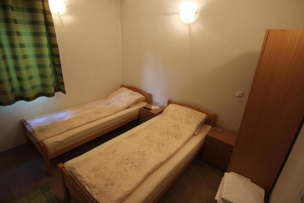 Postel nebo postele na pokoji v ubytování Rooms Zebax