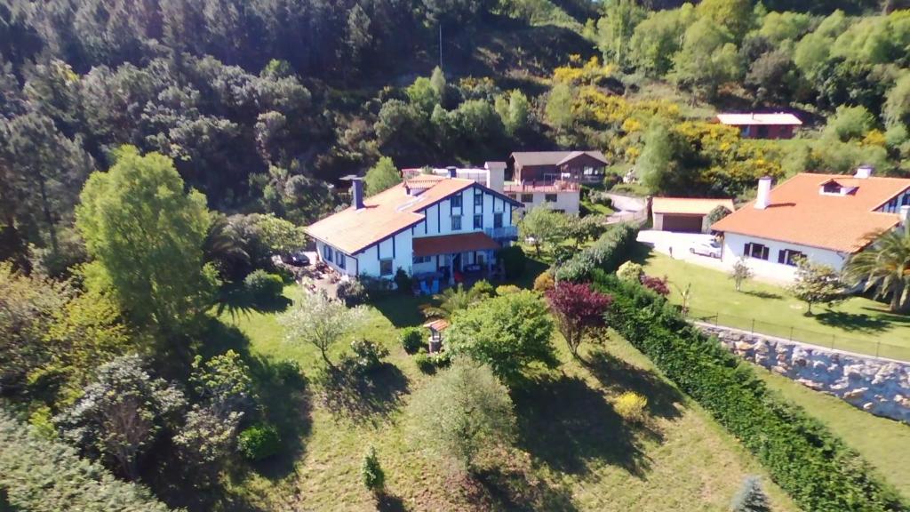 an aerial view of a house in the mountains at Gurbialde Etxea in Mutriku