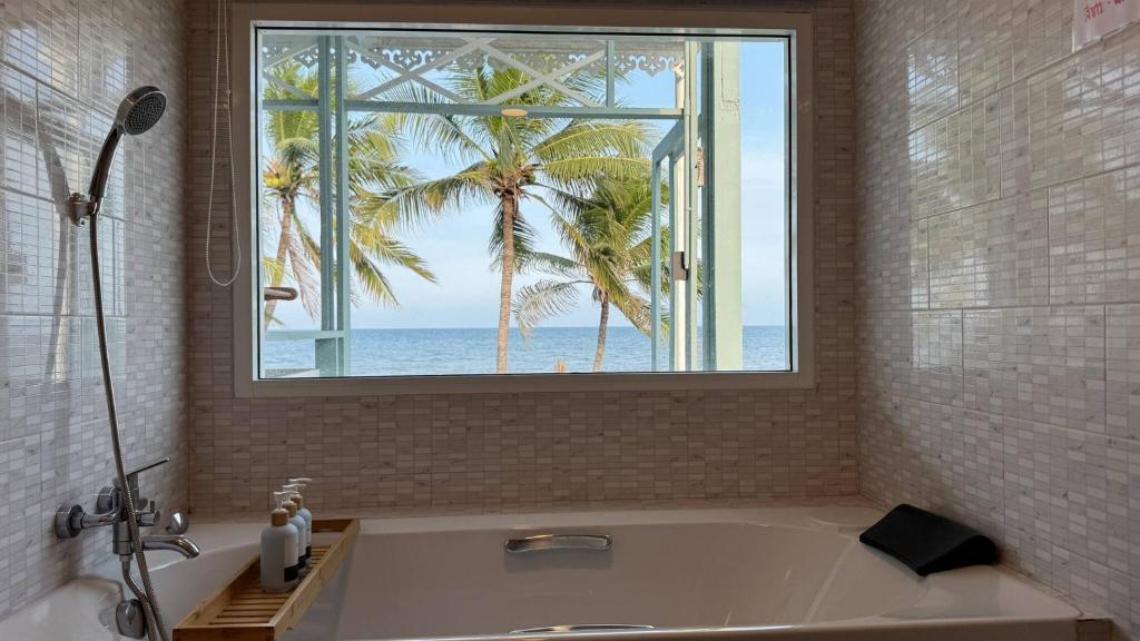 Ένα μπάνιο στο Ocean Bed&tubs, Nflix|BBQ+kitchen area|NightMarket