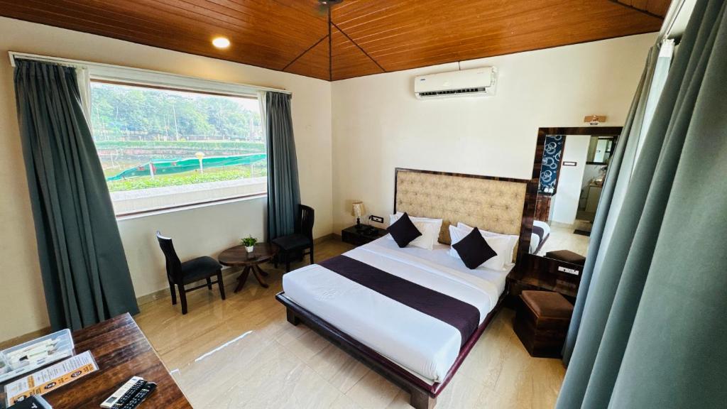 Ένα ή περισσότερα κρεβάτια σε δωμάτιο στο The Luxury Maharaja The Royal Resort