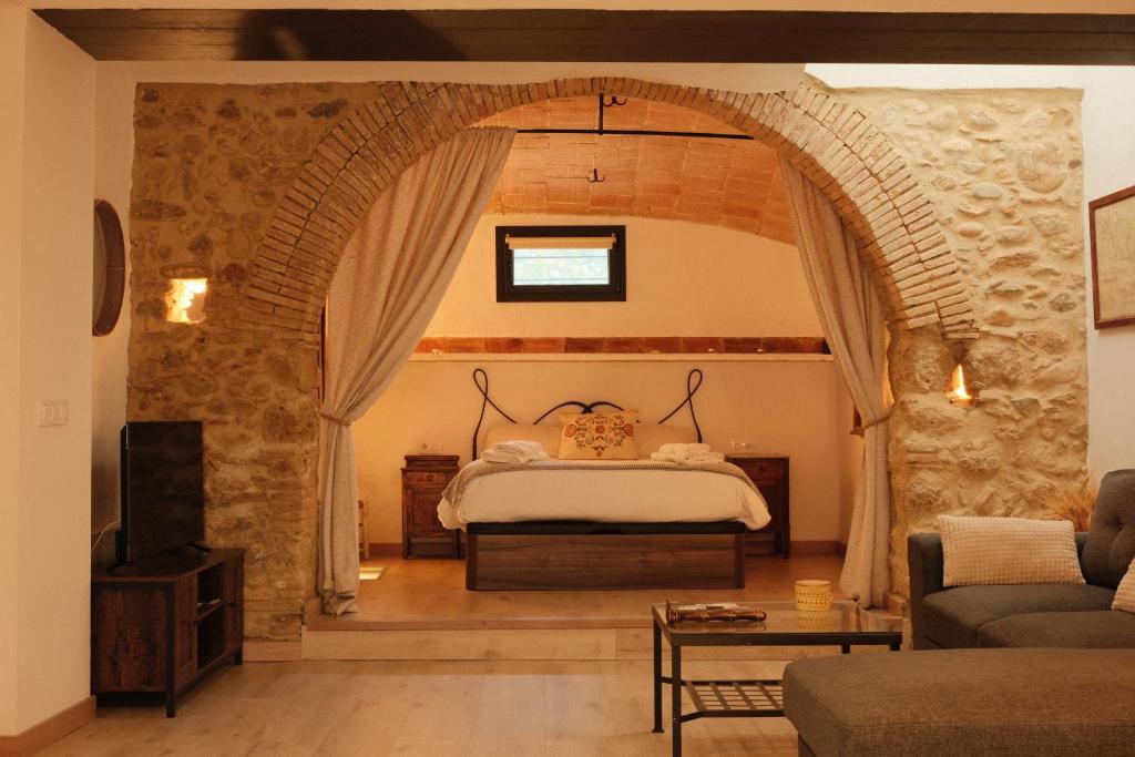 Postel nebo postele na pokoji v ubytování Can Joan Loft Alt Empordà