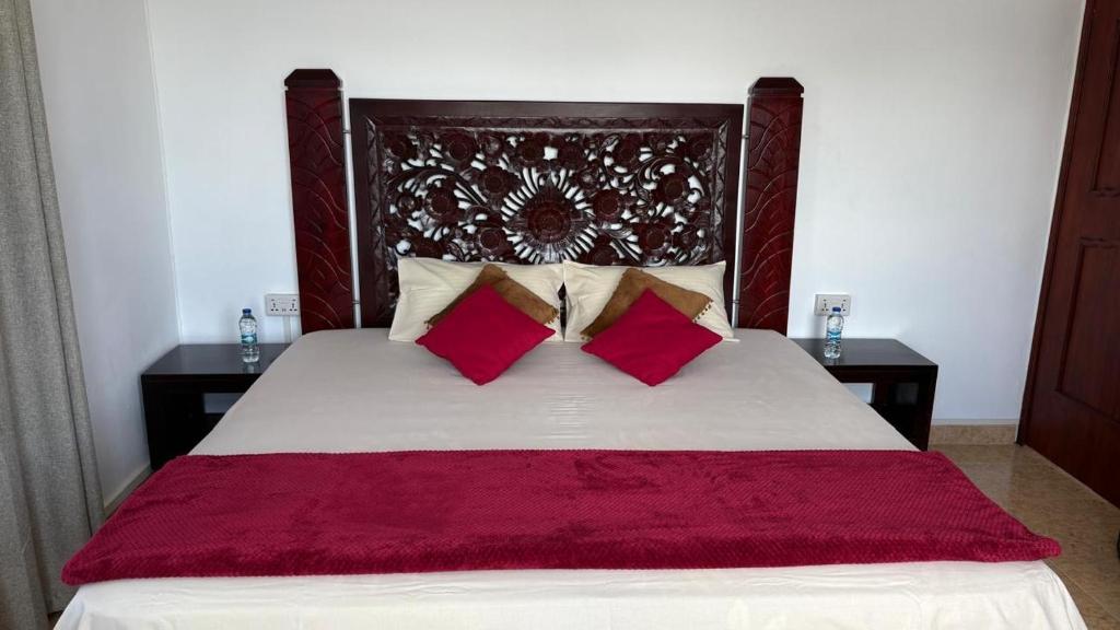 Postel nebo postele na pokoji v ubytování Le Maho AHAVAH