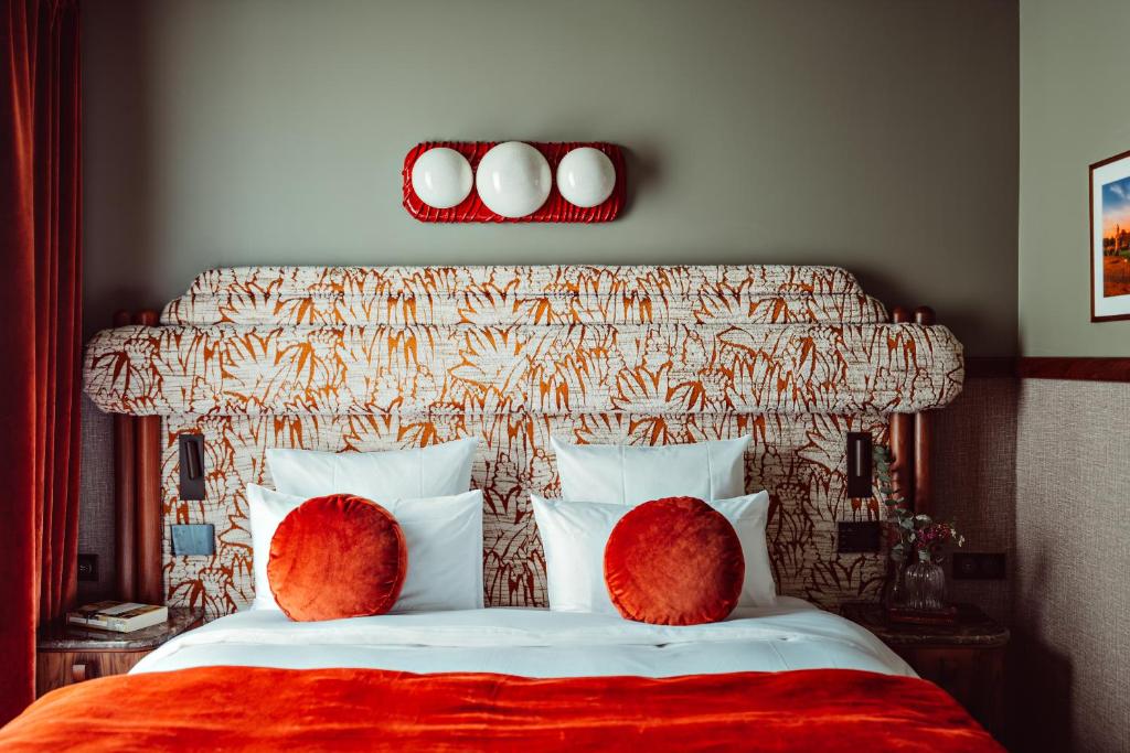 Ένα ή περισσότερα κρεβάτια σε δωμάτιο στο 1.75 Paris La Trêve