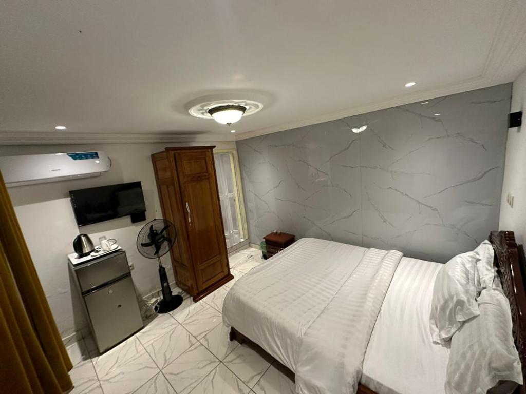 Postel nebo postele na pokoji v ubytování Luxury Villa AC Ensuite Room 6