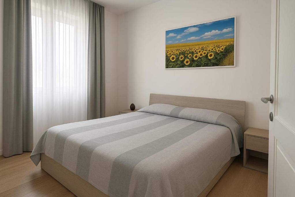 Postel nebo postele na pokoji v ubytování Stella di mare