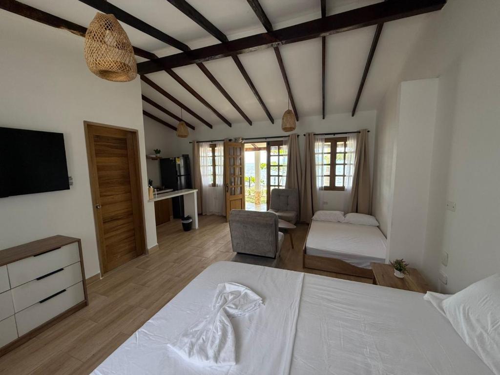 Postel nebo postele na pokoji v ubytování Malibu beach