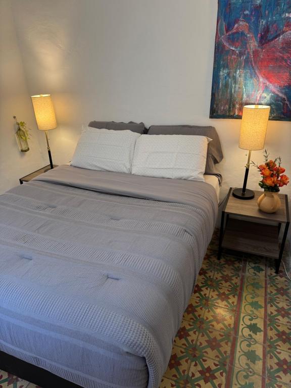 Ένα ή περισσότερα κρεβάτια σε δωμάτιο στο Pacifico