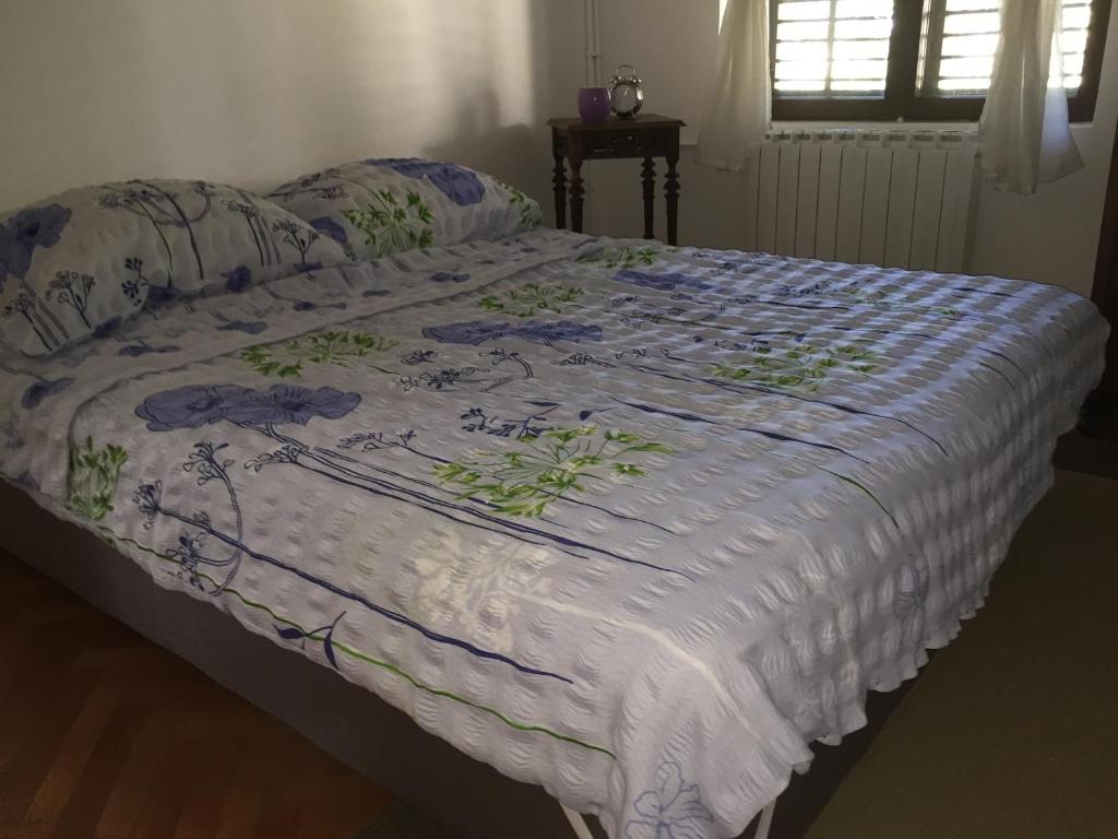 Postel nebo postele na pokoji v ubytování Apartments Oskar
