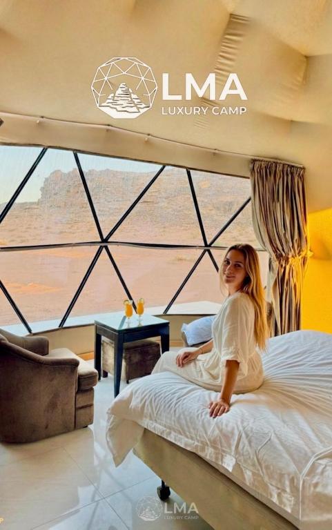 Ένα ή περισσότερα κρεβάτια σε δωμάτιο στο LMA Rum Luxury Camp