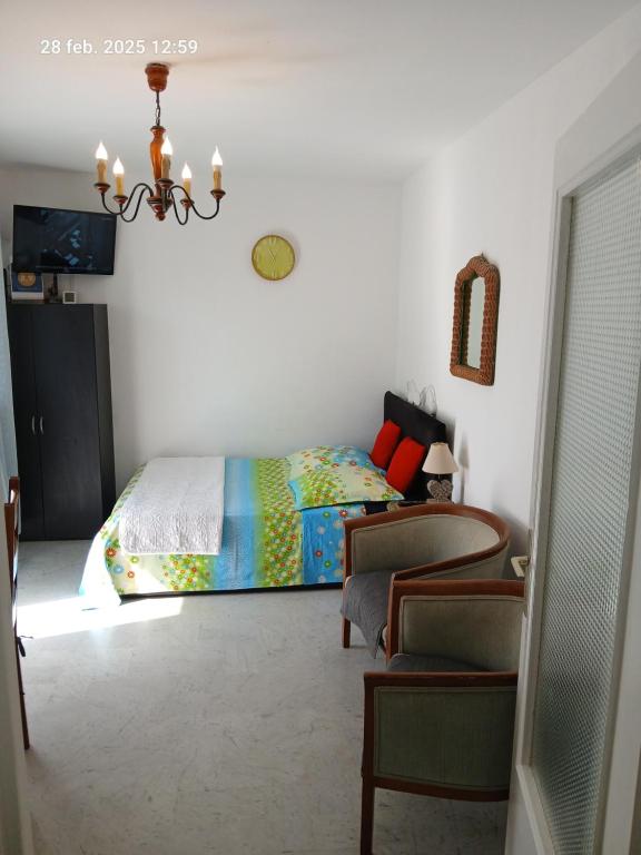 Llit o llits en una habitació de Studio Proche mer Nice