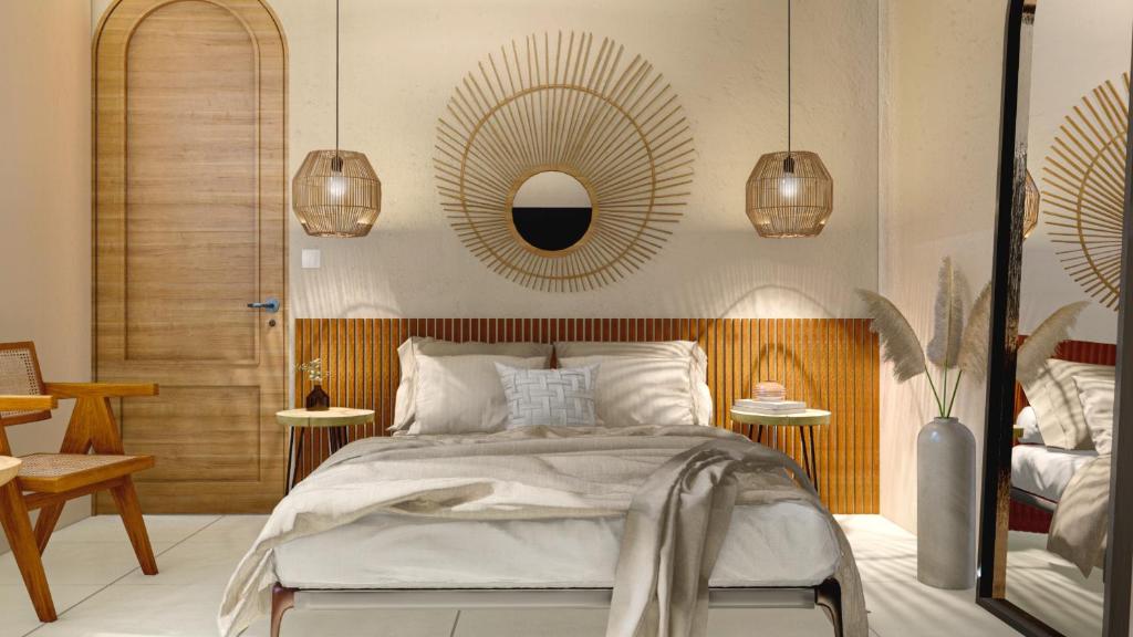 Un pat sau paturi într-o cameră la Hotel Entrelunas