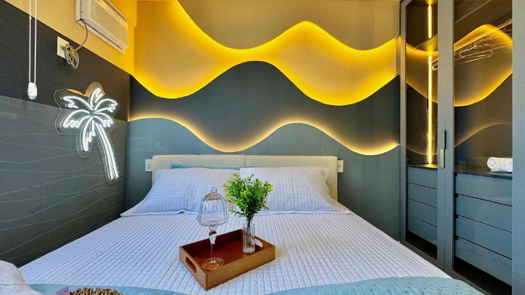 Ένα ή περισσότερα κρεβάτια σε δωμάτιο στο (507) Studio tropical Perto da Praia