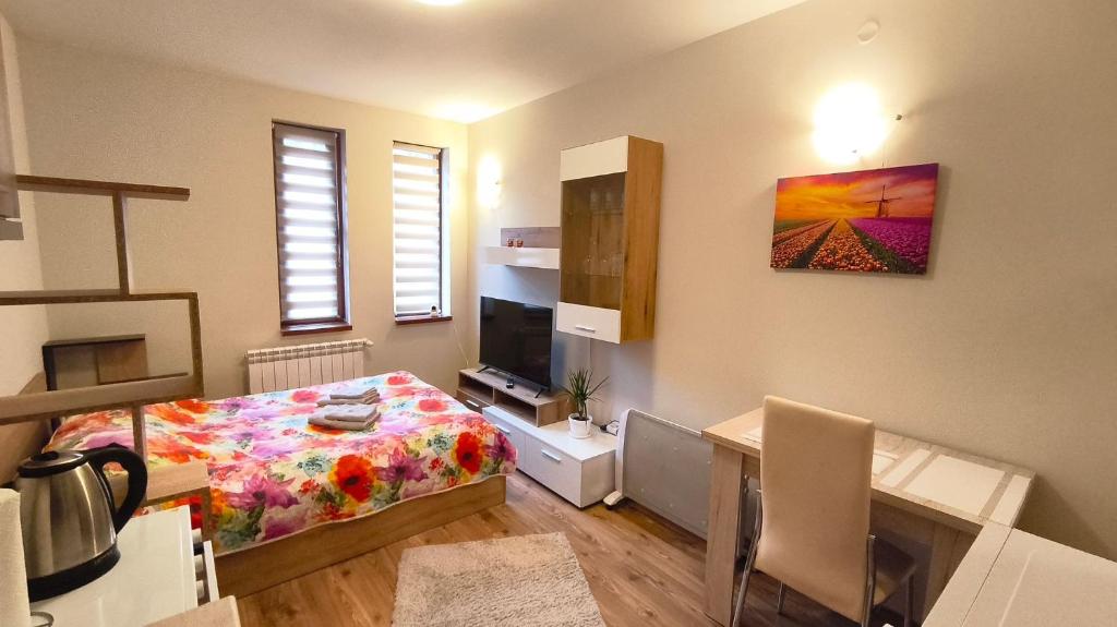 Ένα ή περισσότερα κρεβάτια σε δωμάτιο στο Tulip Studio Deluxe, Grand Resort Pamporovo