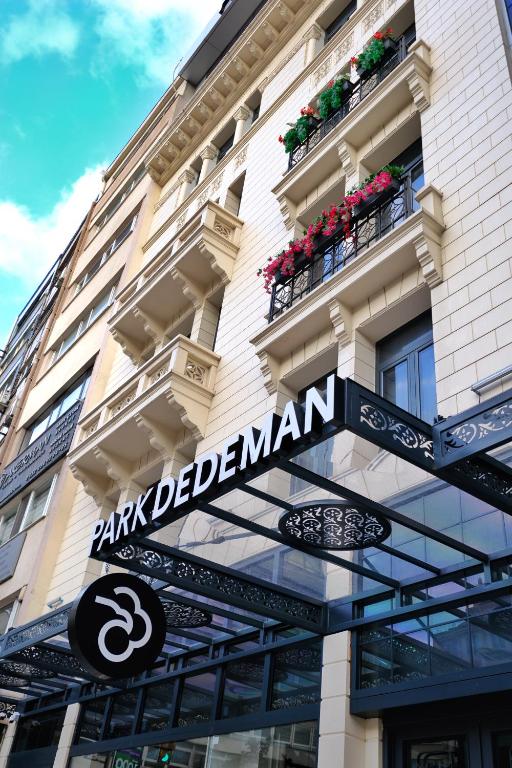 a sign on the front of a building at Park Dedeman Sisli in Istanbul