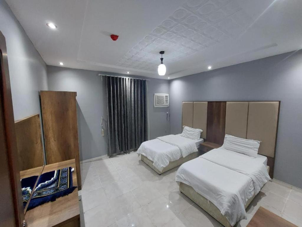 Ένα ή περισσότερα κρεβάτια σε δωμάτιο στο تميز الحمدانية Tamayoz Al-Hamdaneyah