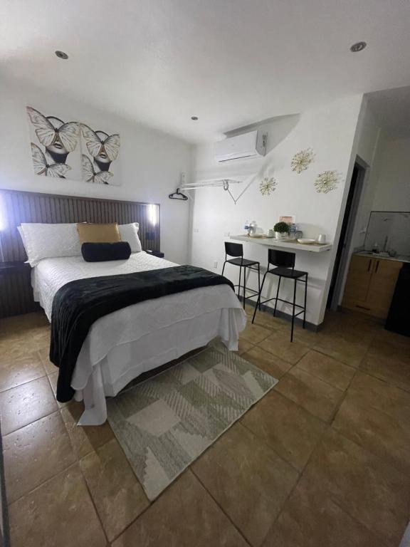 Postel nebo postele na pokoji v ubytování Estudios 303