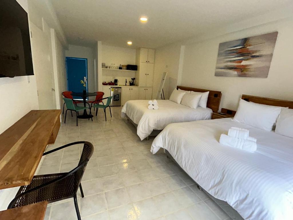 Ένα ή περισσότερα κρεβάτια σε δωμάτιο στο Vida Playa El Agua