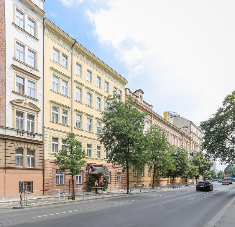 an empty street in front of a building at City Club Prague in Prague