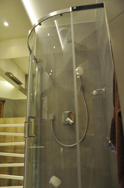 Kúpeľňa v ubytovaní Apartament Stalowy Kościelisko Sywarne