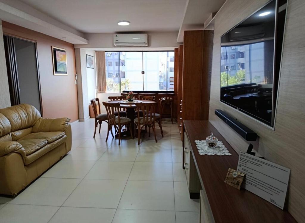 a living room with a couch and a table at Villa Anto in Encarnación
