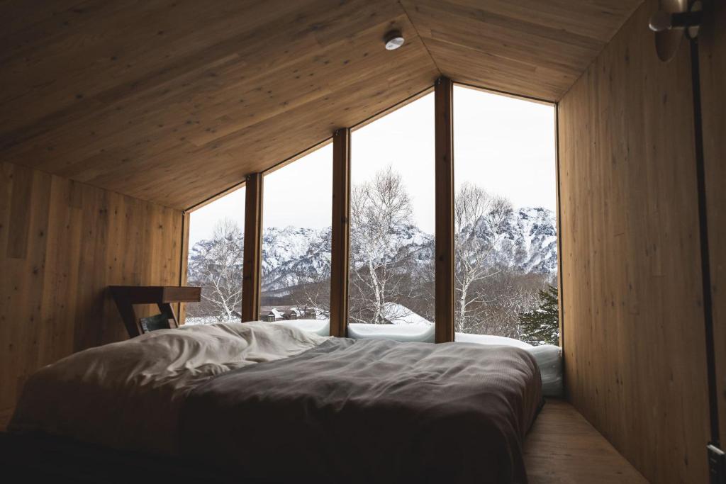 Postel nebo postele na pokoji v ubytování Earthboat Togakushi