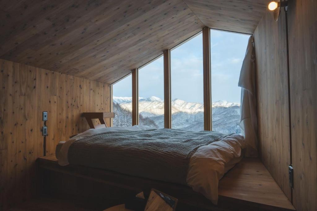 Ένα ή περισσότερα κρεβάτια σε δωμάτιο στο Earthboat Minakami Hodaigi