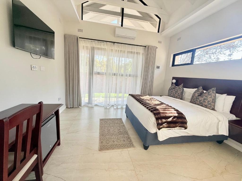 Giường trong phòng chung tại 19 on Bay Noakes