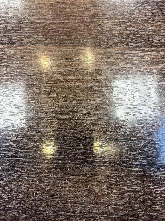 a close up of a wooden table with lights on it at суппорт для станка in Zhezdi