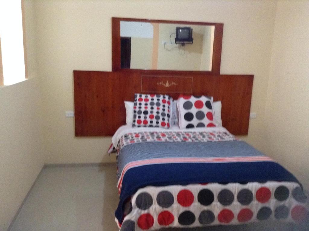 Postel nebo postele na pokoji v ubytování Hostal Buenos Aires