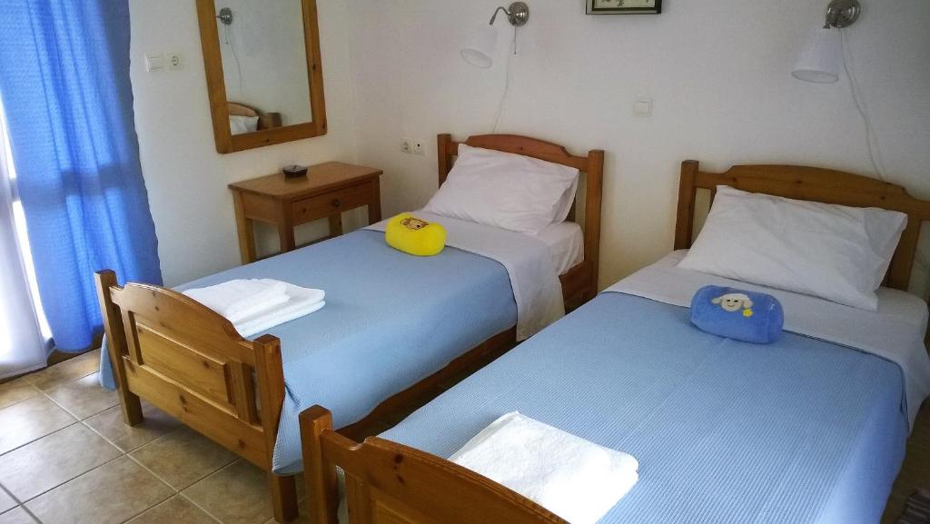 Postel nebo postele na pokoji v ubytování House of Polymnia