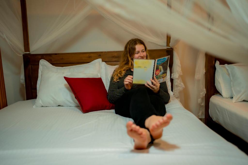 Postel nebo postele na pokoji v ubytování Rainforest field view resort