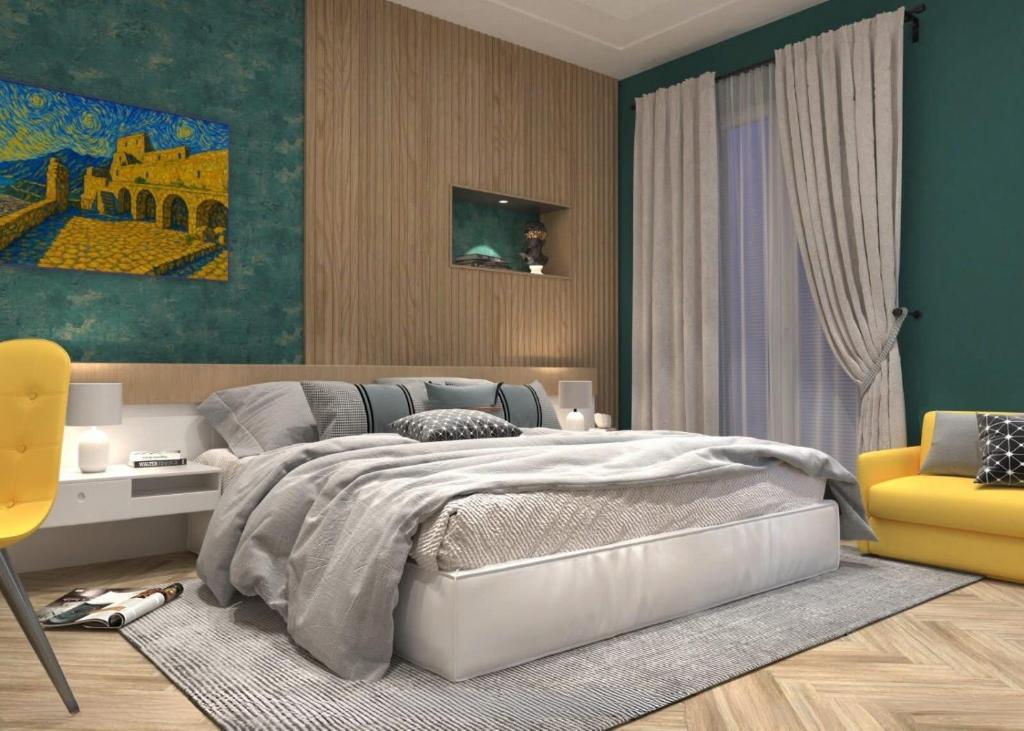 サレルノにあるResidence Arechiのベッドルーム1室(ベッド1台、黄色い椅子付)