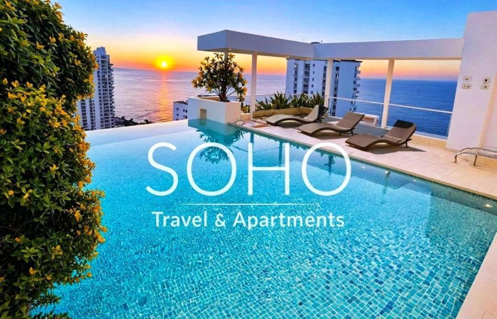 a view of a swimming pool with the words solo travel and apartments at Apartamentos Neos - Cerca al Mar by SOHO in Santa Marta