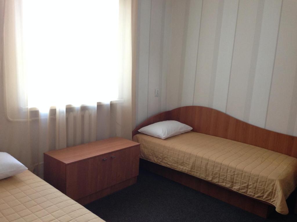 Postel nebo postele na pokoji v ubytování U Fedora
