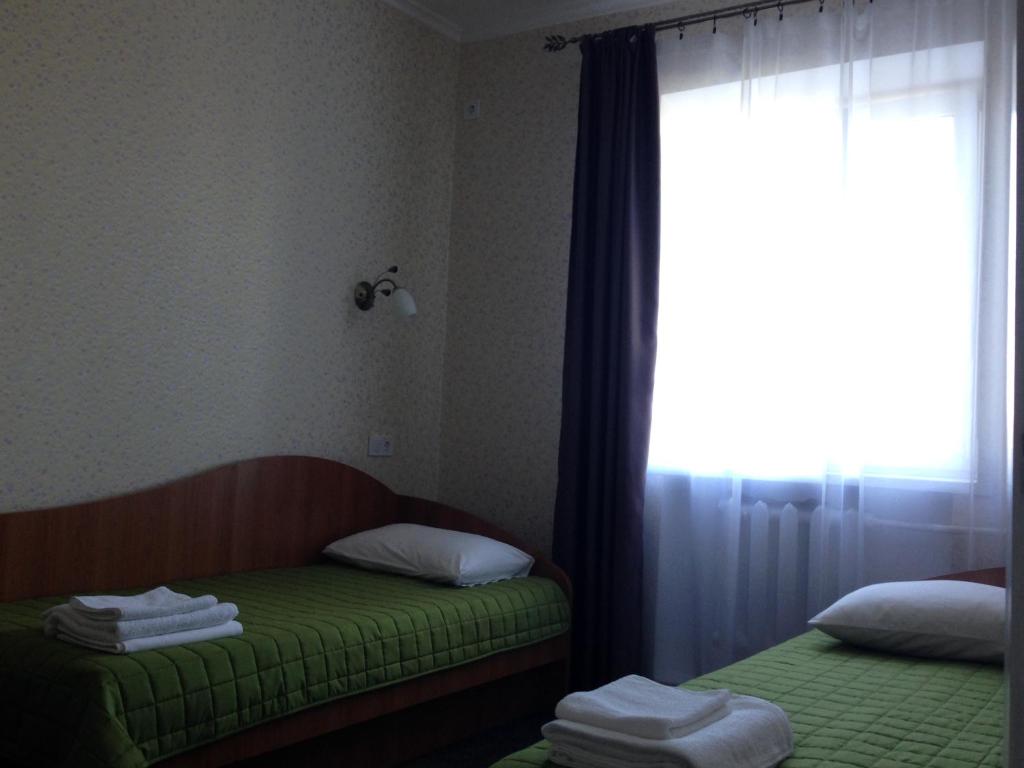Postel nebo postele na pokoji v ubytování U Fedora