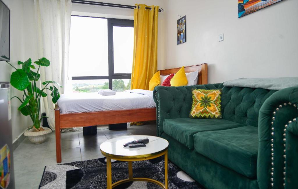 Ένα ή περισσότερα κρεβάτια σε δωμάτιο στο Stay With Moraa