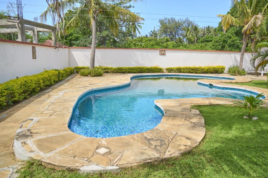 Bazén v ubytování Garden Villa nebo v jeho okolí